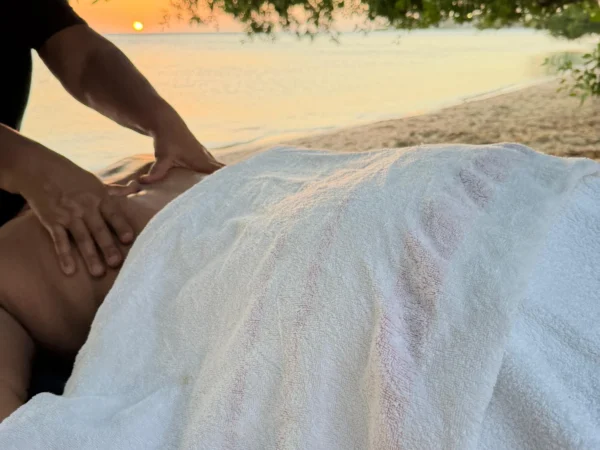 Beach aromatherapy massage in Aruba under the trees