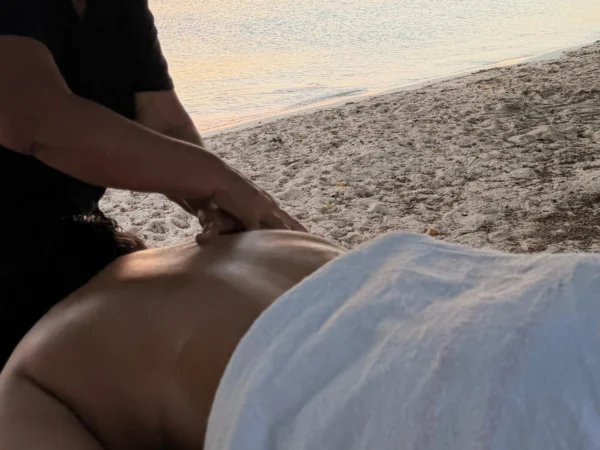 Beach deep tissue in Aruba on the sand at sunset